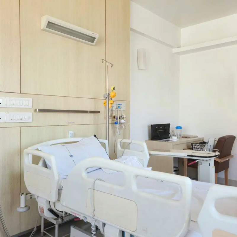 Electric adjustable hospital bed with motor drive system.